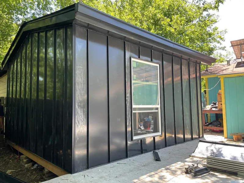 Black standing seam metal wall panels for Roof Inspection in Homosassa Springs