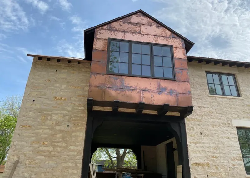 Copper metal panel facade on a stone building for Metal Roof Coating in Homosassa Springs
